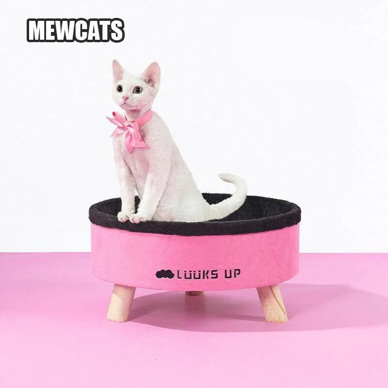 069bea76b318fca3b6b964076318277b7377bd998672f6edcf97285610d2e36c.webp Pink Warm Cat Elevated Bed - Image 1
